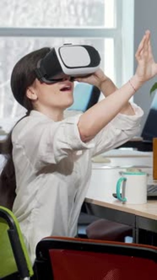 Woman Uses VR Headset in Modern Office