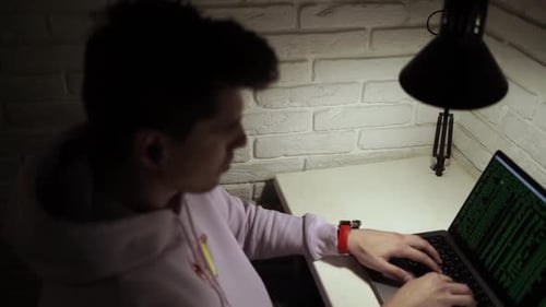 Man coding on laptop. Closeup of developer programmer, soffware engineer, IT support Vlad