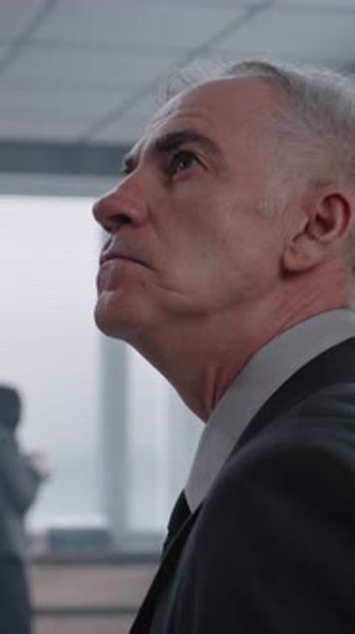 Office Robbery Case Close Up of Male Detective Examining Crime Scene