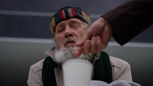 Donation of Coins to Man in City