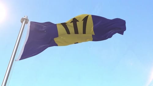 Barbados Flag Waving in Wind Against Blue Sky