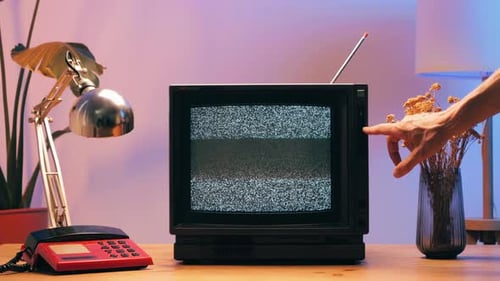 Vintage Television Powering On with Static Screen