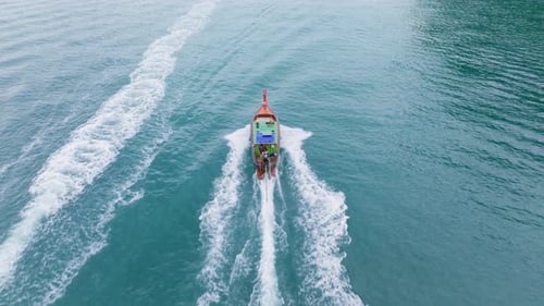 Stunning Aerial View of LongTail Boat on the Waters in Krabi Thailand
