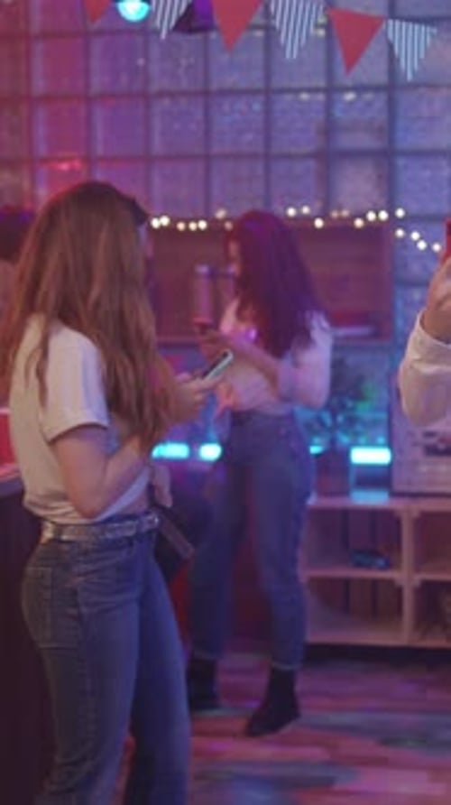 Young Adults Celebrating at a Birthday Party