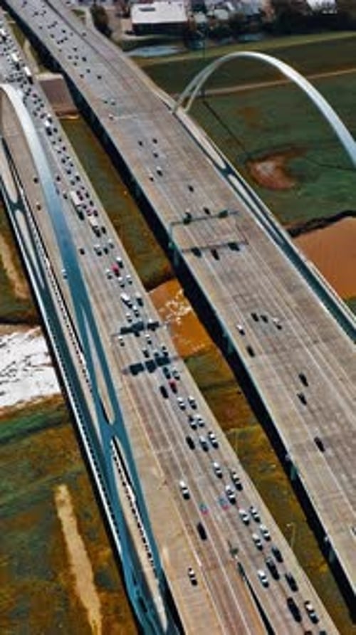 Aerial view showcases busy highway in Dallas, USA during daylight