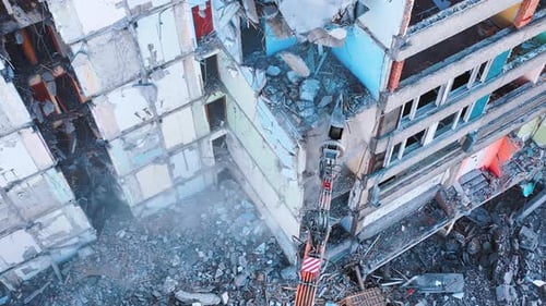Excavator Demolishing Old Building in the City