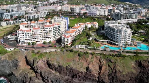 City Buildings on a Cliff Near Ocean
