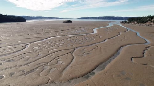 Aerial View of Mudflat Landscape on Sunny Day
