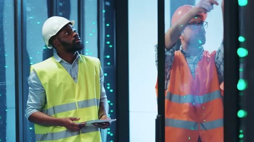 A Group of Construction Workers Collaborating Effectively in a StateoftheArt Data Center