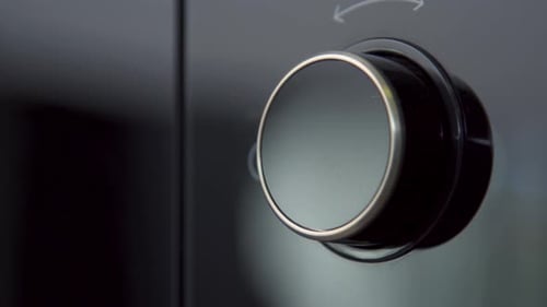 Modern Oven Knob Rotating Adjusting Cooking Settings