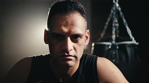 Man Rest in the Gym After Fighting Punch Sport Competition