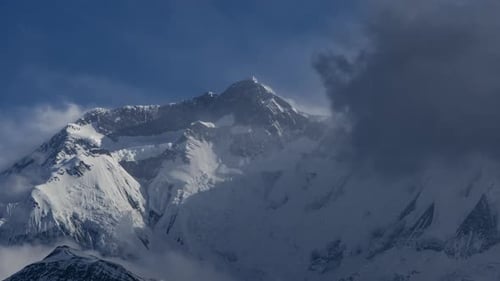 Annapurna Two Timelapse with moving clouds. Tight shot from Manang Valley.