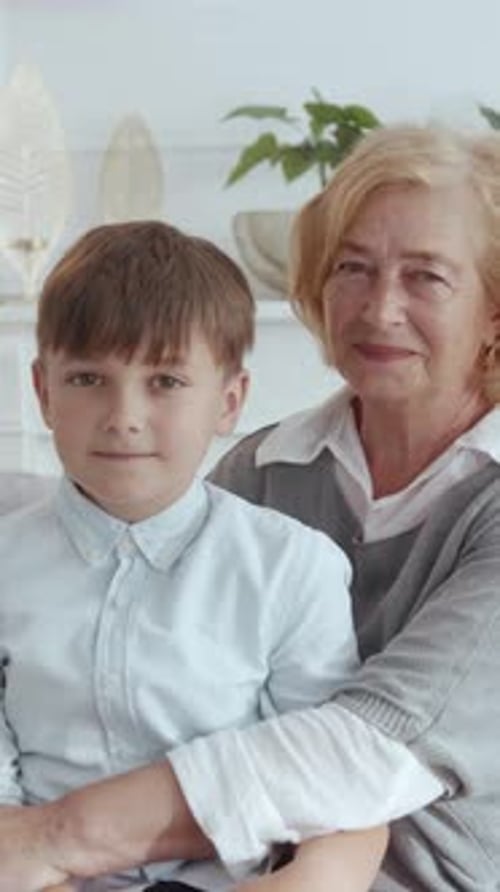 Grandmother and Grandson Portrait Sitting at Home