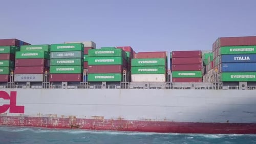 Container ship loaded with Shipping containers at sea