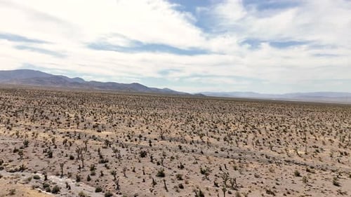 Drone flying a large circle over a desert landscape in 4k