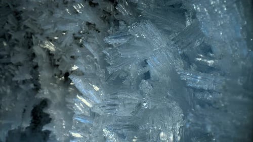 Closeup View of Blue Ice Crystals in a Frozen Cave Smooth Slider Movement