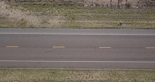 Drone — Looking straight down at a long stretch of Texas highway