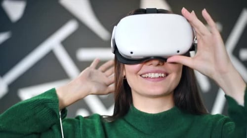 Woman Smiles Using Virtual Reality Headset
