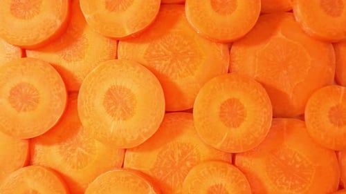 Vibrant Carrot Slices in a Colorful Close-Up