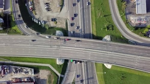 A Stunning Aerial View Capturing the Intricate Urban Intersection Along with Dynamic Traffic Flow