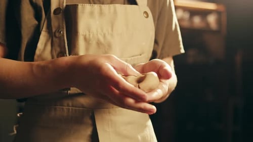 Woman Potter Works with Clay on Master Class in Studio Working Process in Ceramic Workshop Potter