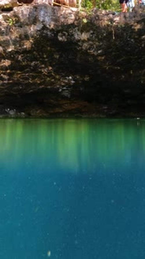 Underwater View of Natural Pool with Sunlight