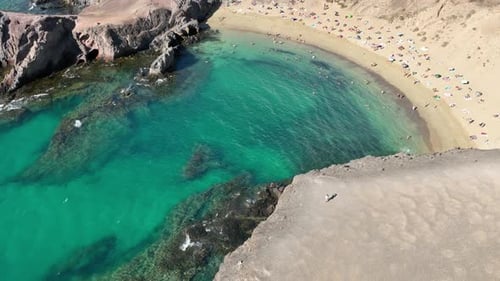 Aerial view of beach and turquoise water, Spain.