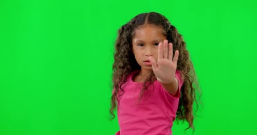 Stop hand, child portrait and green screen with anger and no emoji sign