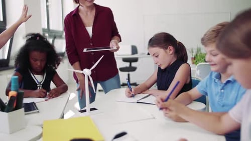 Children learning about wind turbine in the classroom