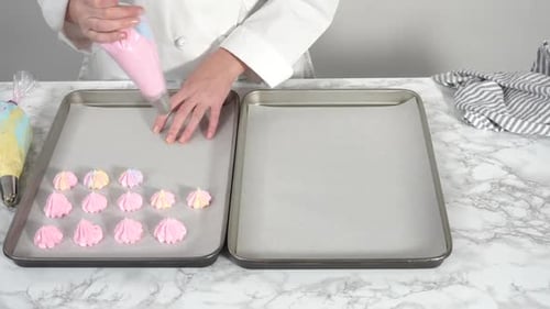 Step By Step Piping Unicorn Meringue Cookies to the Baking Sheet Lined with a Parchment Paper