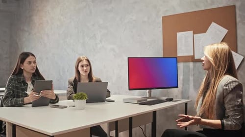 Young Adults Meeting in Modern Office Workplace