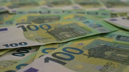 Pile of One Hundred Euro Bank Notes