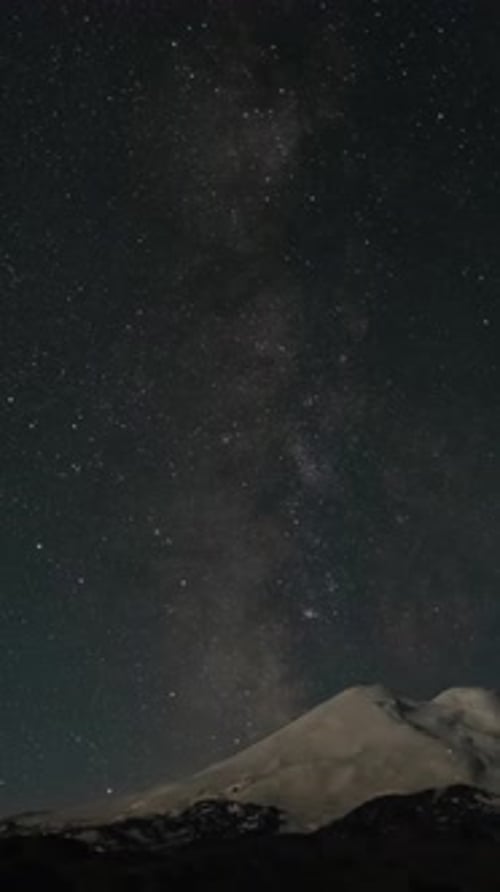 Night Sky Above Mount Elbrus and Dawn