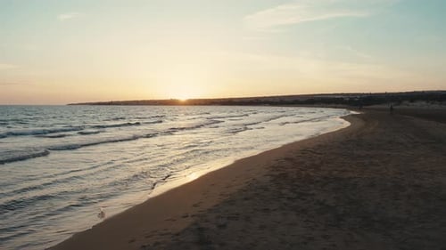 Sunset Over The Calm Ocean