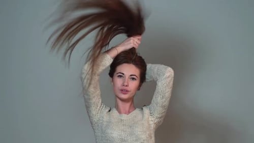 Woman Styles Long Brown Hair Indoors