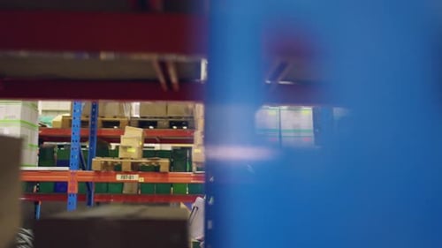 Caucasian attractive man industrial worker work in manufacturing plant.