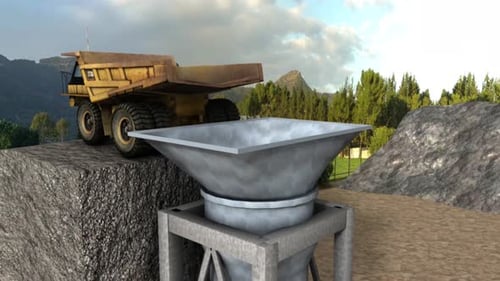 Industrial conveyor belt transporting rocks into crushing machinery