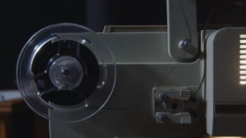 A Closeup of a Vintage Film Projector That Captures the Beauty of Classic Cinema Art