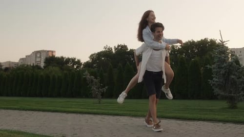 Couple Having Fun In The Park