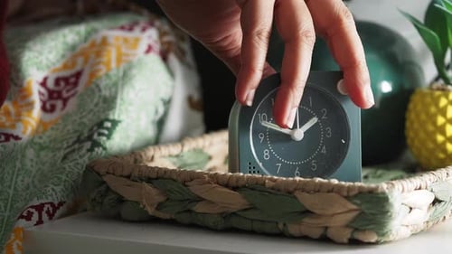Alarm Clock on a Bedside Table