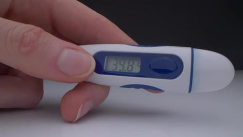 Macro shot of thermometer showing high temperature. Probe lens, sick, studio shot.