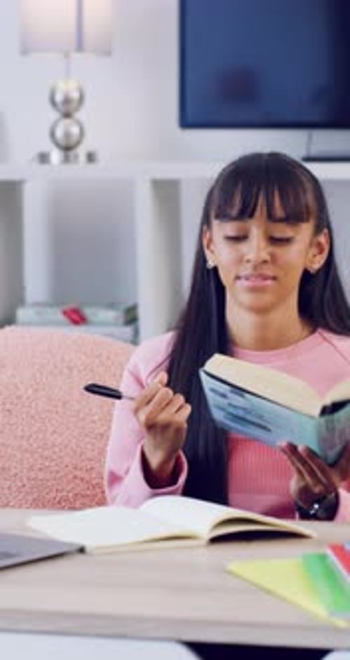 Education, teen and writing with book in home, academic development and relax after homework