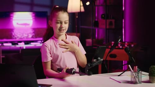 Gen z Youngster Filming Video with Phone Attached to Selfie Stick for Online Channel