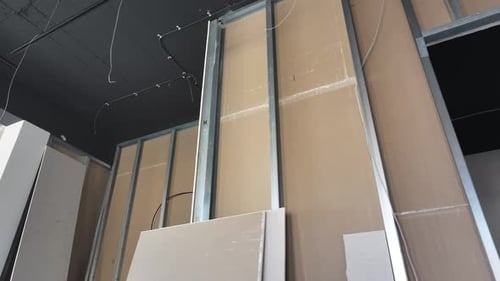 Room With Metal and Drywall Wall