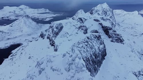 High Mountain Rocky Peaks Covered in White Snow Provide a Breathtaking Bird'seye View The Panoramic