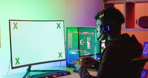 Teen Plays Video Game At Home