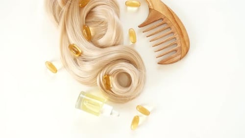 Shiny Wavy Blond Woman Hair Strand Woman Hair Strand Curl Curly Hairstyle Hair Care and Beauty Salon