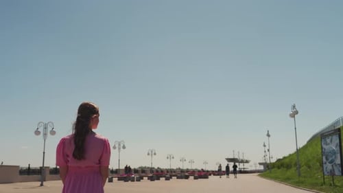 People enjoy city park on sunny day