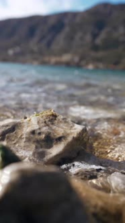 Vertical of Rocky Coast with Stones and Stones