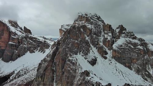 Rocky Snow Mountains and Clouds